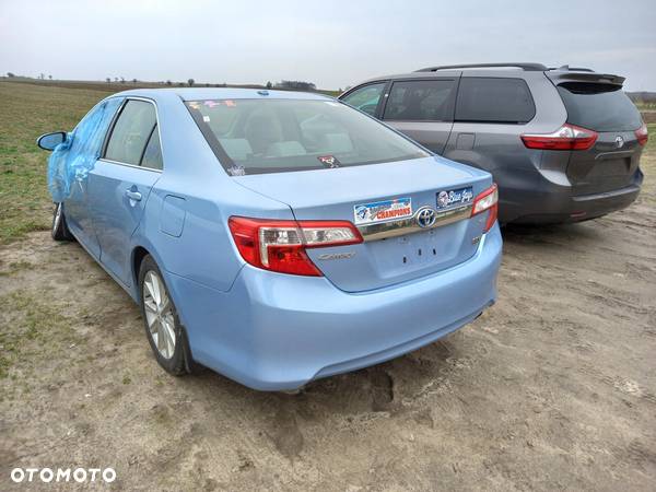 TOYOTA CAMRY VII zacisk tył jarzmo prawy 11-18 - 7