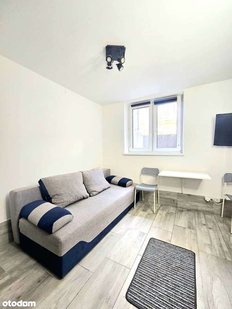 Garsoniera w suterenie z miejscem postojowym-1