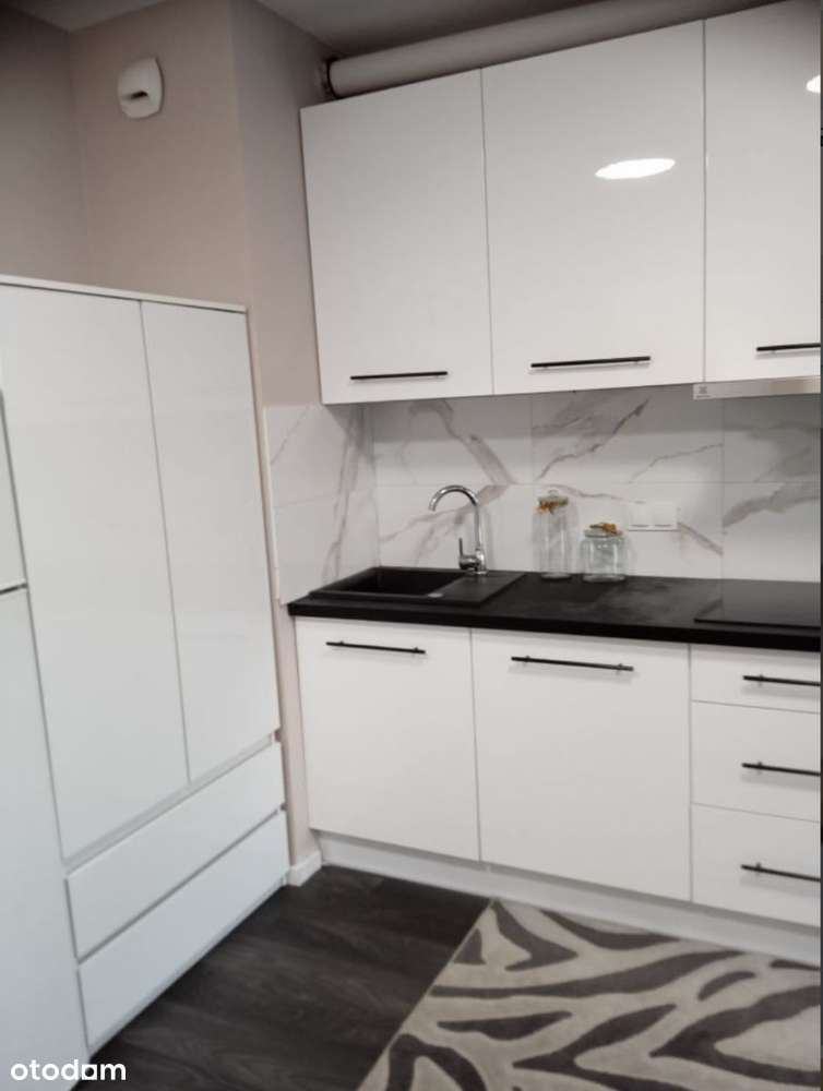 | Nowy Budynek | Winda | Balkon | Lokalizacja |-5