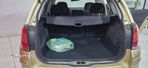 Opel Astra 1.4i 16V Club - 14