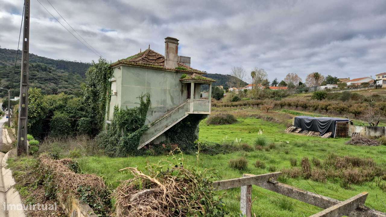 Casa em lote urbano mais 02 rústicos urbanizáveis com área total de...-7