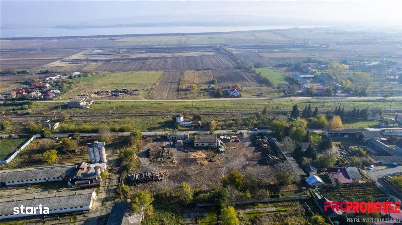 Racaciuni - teren intravilan 6.886mp - hale in suprafata de 265mp-1
