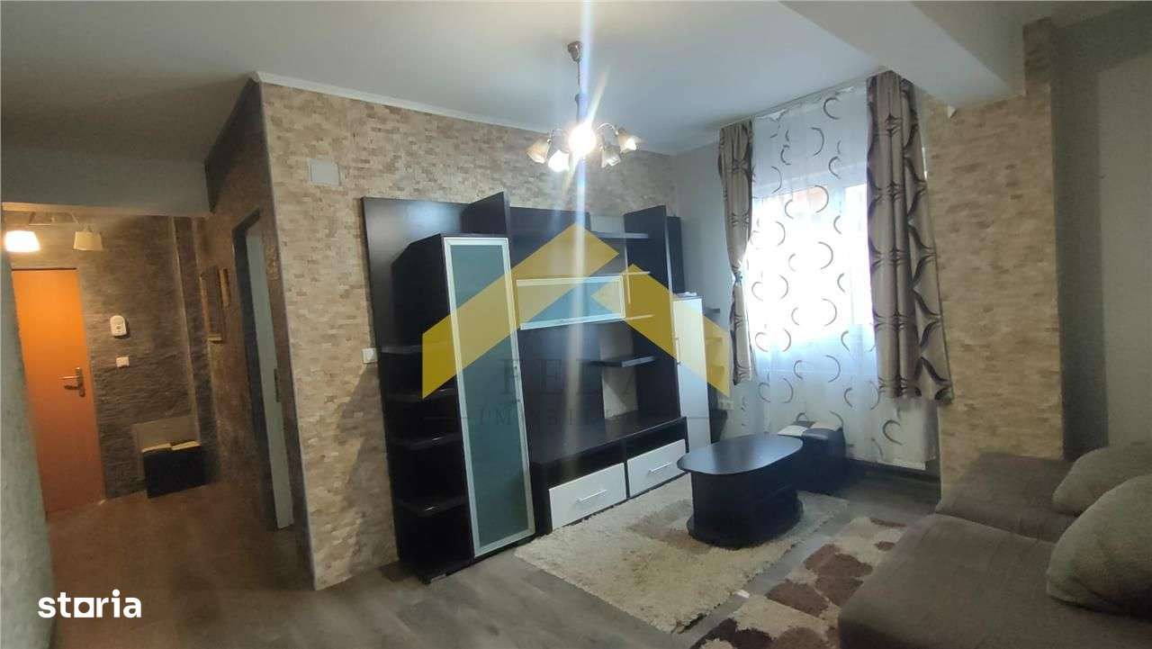 Apartament la parter 2 camere de vanzare in zona Alfa-0