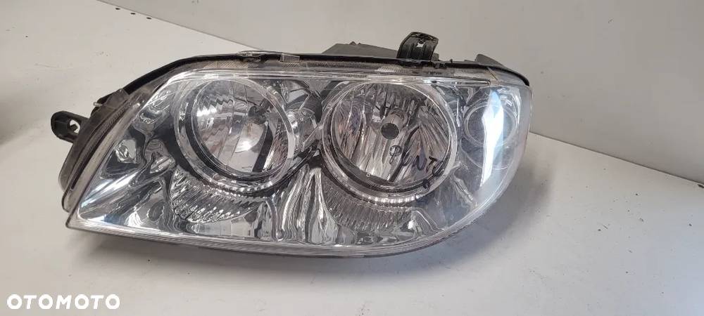 LAMPA PRZEDNIA  LEWA FIAT PUNTO II FL - 1