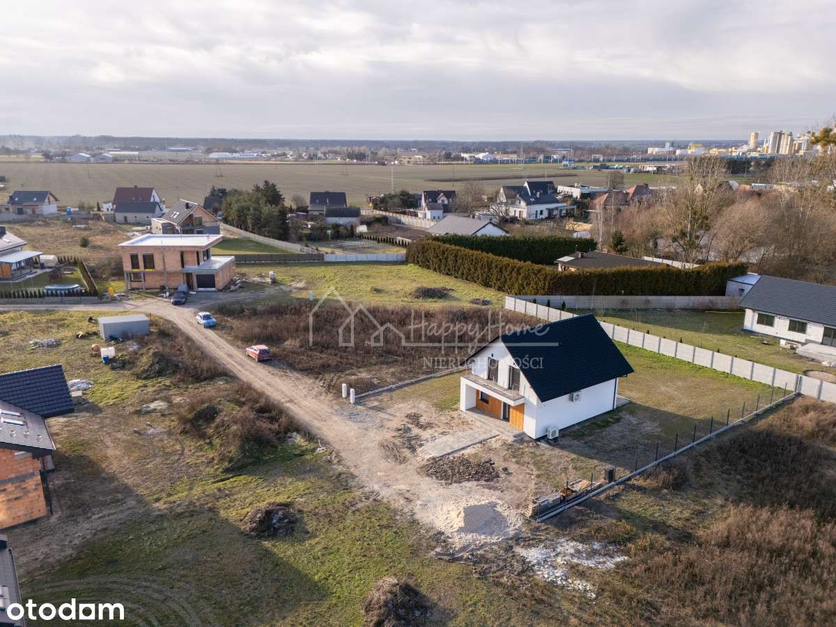 Nowoczesny dom wolnostojący w Kępie—Cicha okolica-1