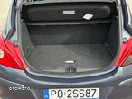 Opel Corsa 1.2 16V Cosmo - 34