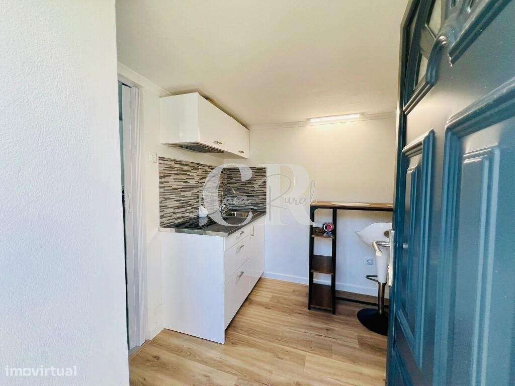 Moradia acolhedora no centro histórico com potencial de investimento-5