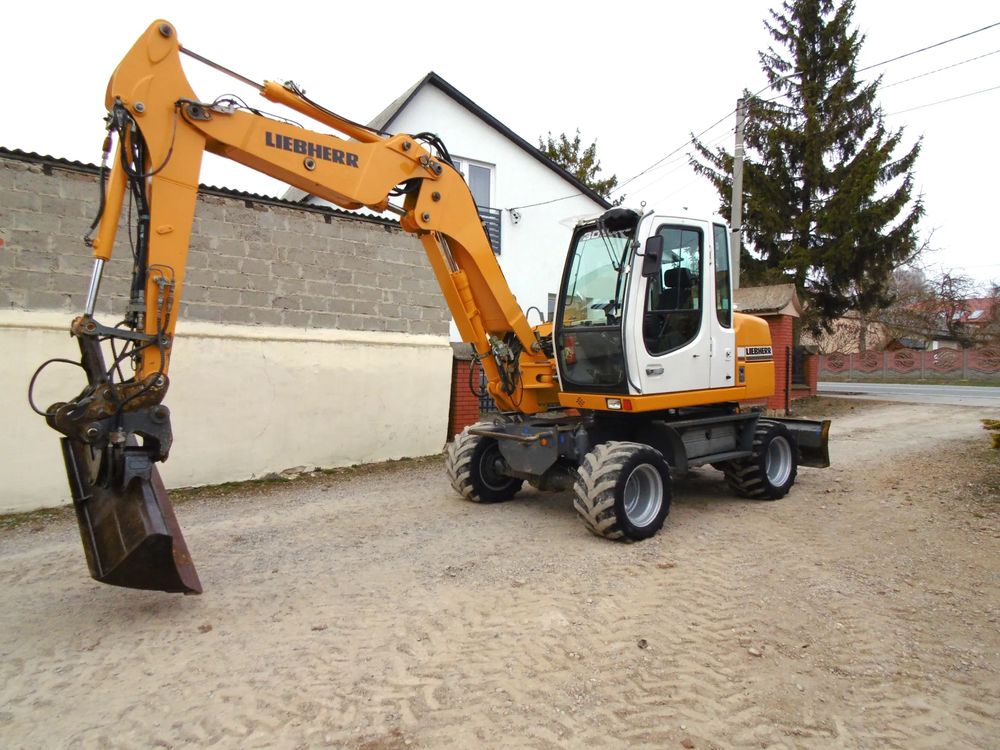 Liebherr 309 litronic 2006