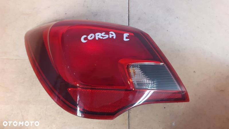 LAMPA TYŁ TYLNA LEWA OPEL CORSA E - 1