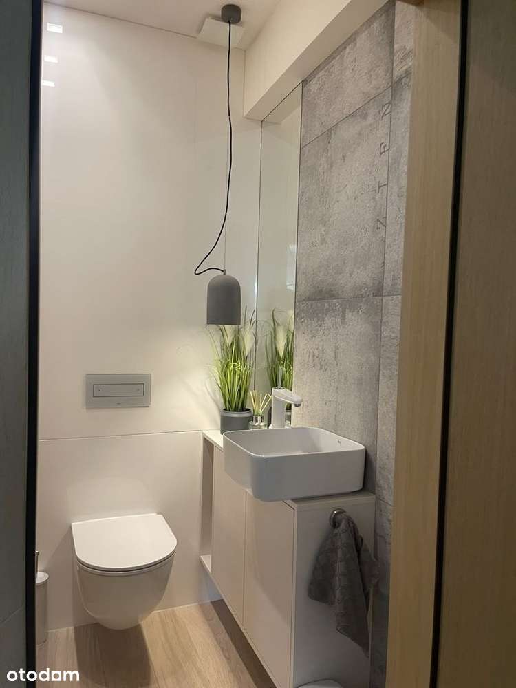 Nowoczesny dom z garażem, pompą ciepła i solarami-7