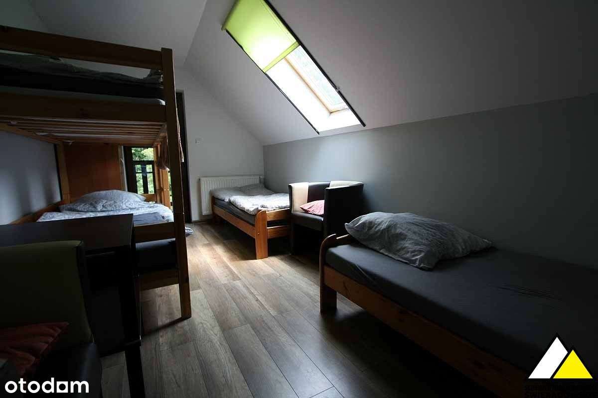 Dom z pokojami do wynajęcia i sklepem.-14