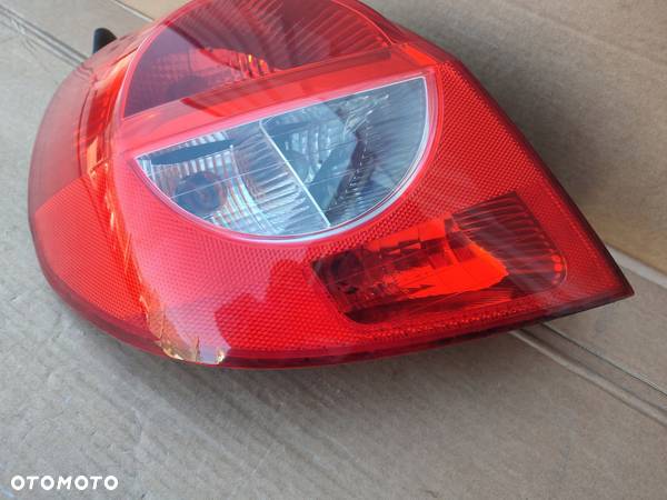 Lampa lewy tył RENAULT CLIO III 3DRZWI EUROPA ORYGINAŁ 89035079 - 4