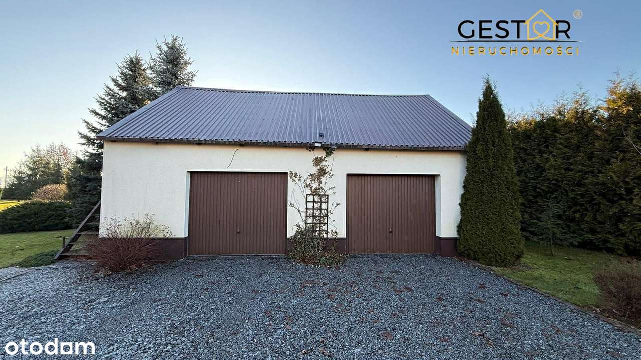 Dom z pięknym ogrodem i stawem_działka 5 739 m²_taras_pompa ciepła-14