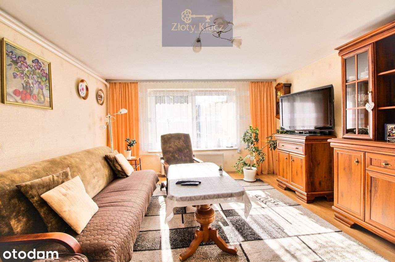 Dom z tarasem-5 pokoi-ogród-dwa garaże murowane-3