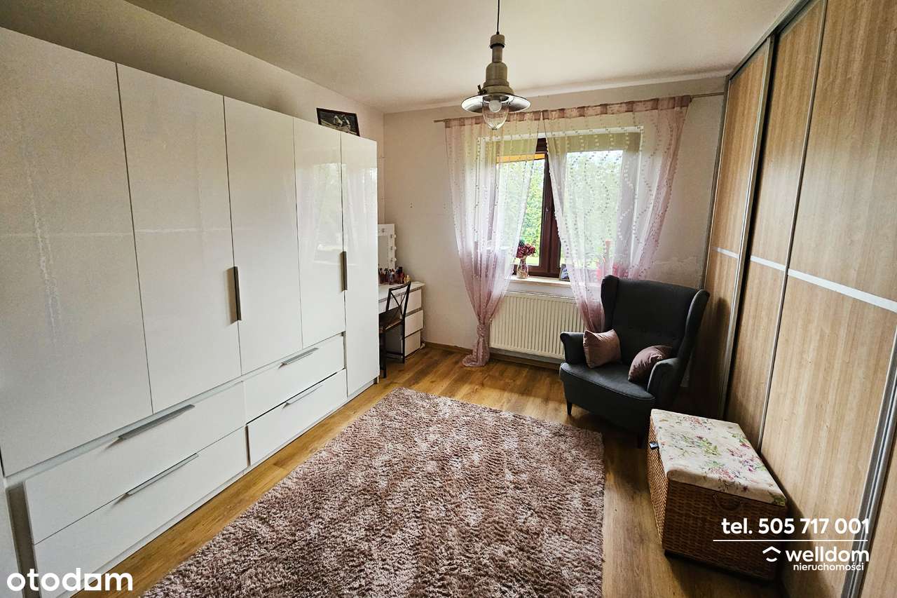 Przestronny dom, duża działka ze stawem-8