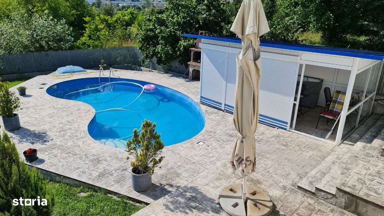 Vilă cu piscină de vânzare în Curtea de Argeș - Imagine principală: 4/12