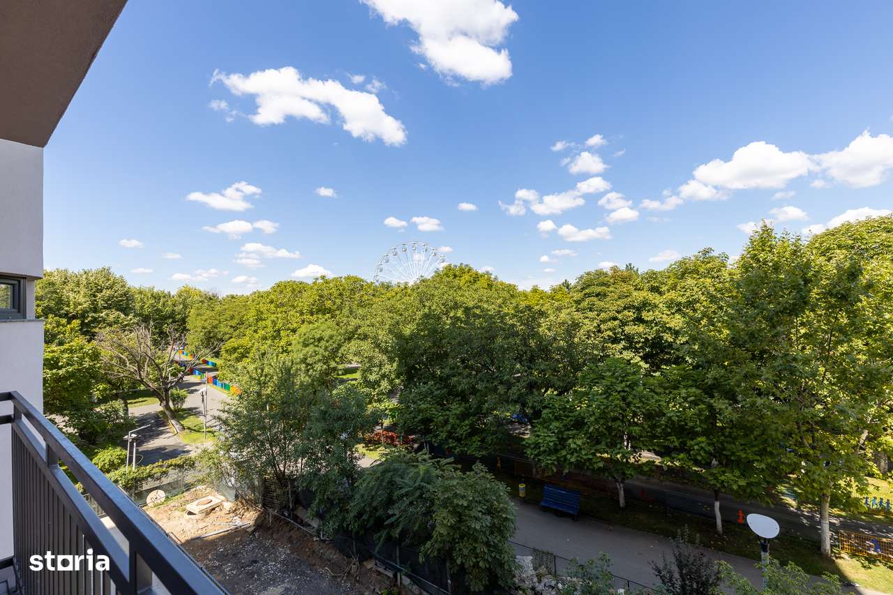 Garsoniera open space intima, etaj 8, cu balcon si priveliste in parc - Imagine principală: 4/14