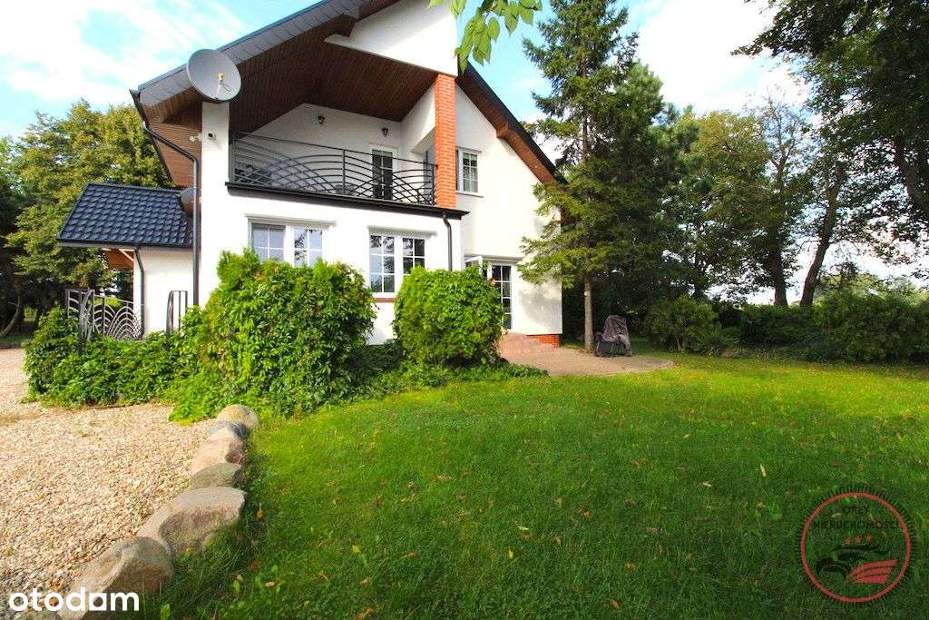 Dom z Ogrodem nad Jeziorem – Komfort i Spokój w Dź-10