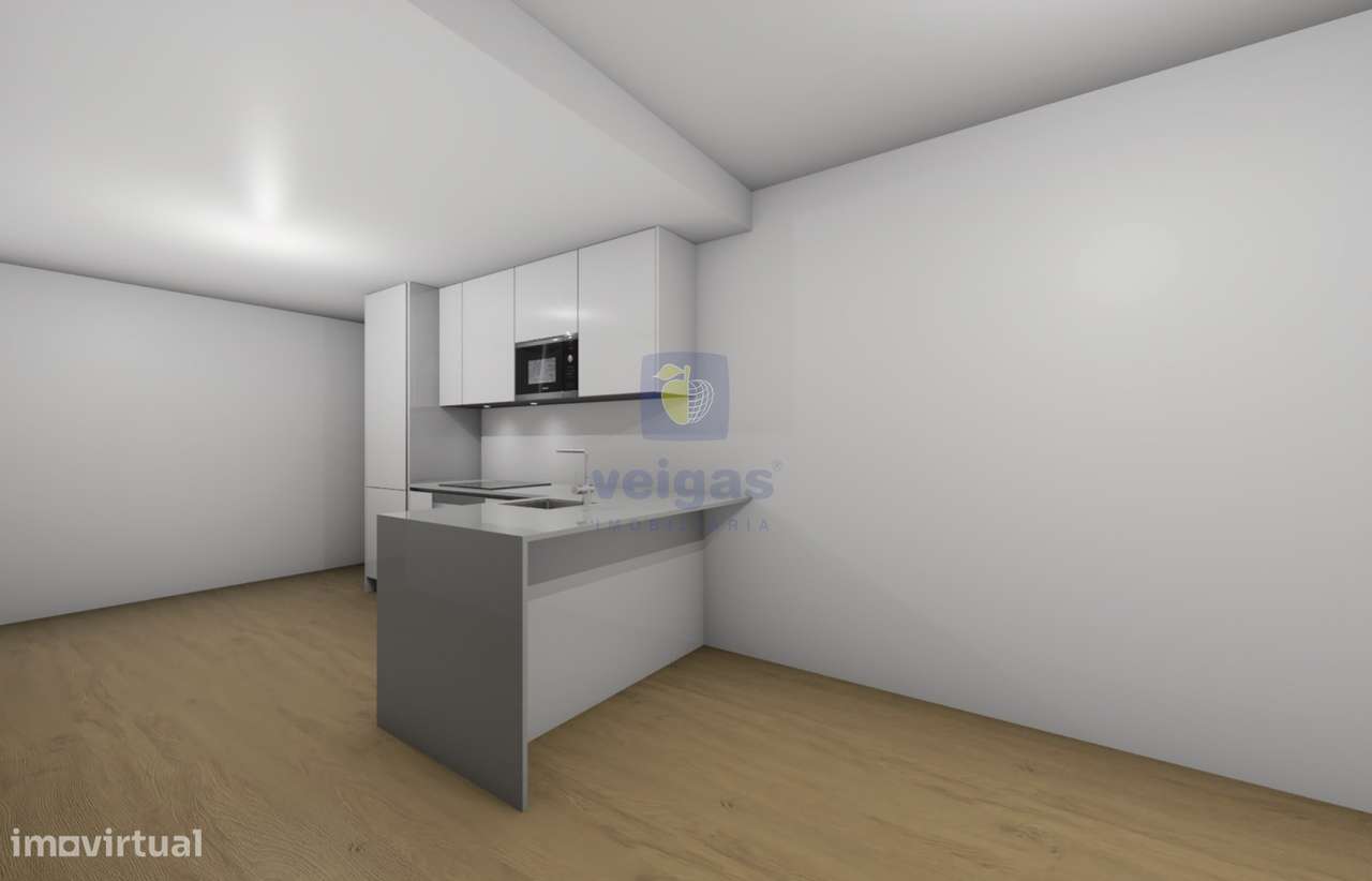 Apartamento T2 com terraço com duas frentes ao nível do RC no empreend-17