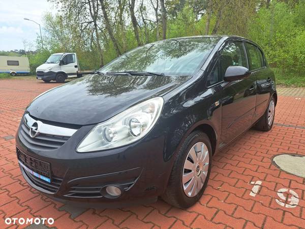 Opel Corsa 1.4 16V Enjoy - 23