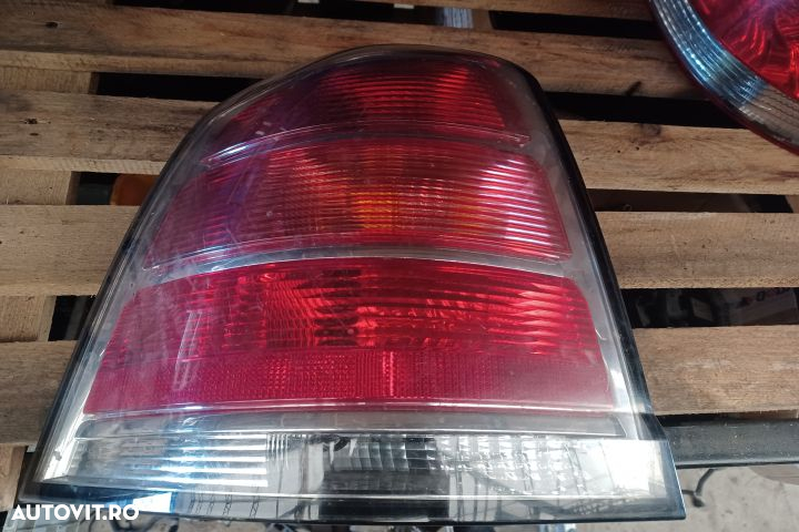 Lampa stop stanga pe aripa Opel Zafira B  [din 2005 pana  2010] seria Minivan 5-usi 1.9 CDTI MT (10 - 2