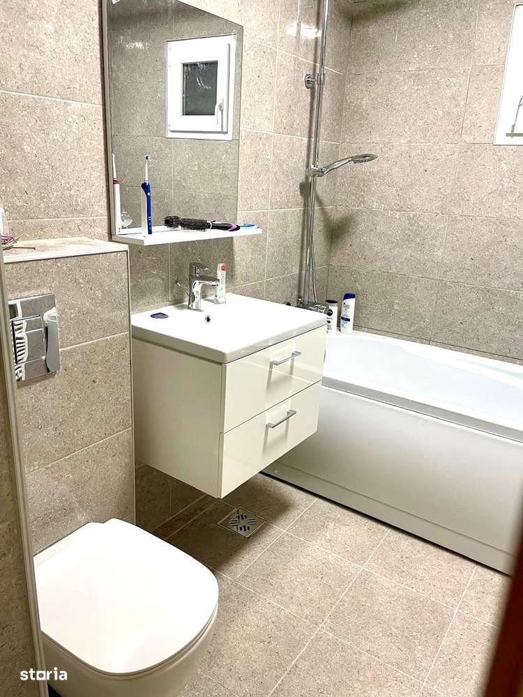 Apartament finisat 3 camere , garaj sub bloc zona Dva Nord-5