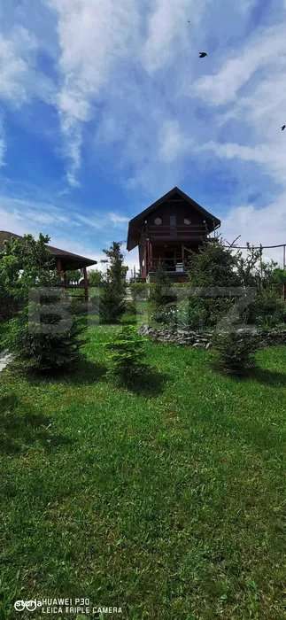 Casuta cocheta cu panorama superba asupra satului Campenesti si a lacu - Imagine principală: 4/9