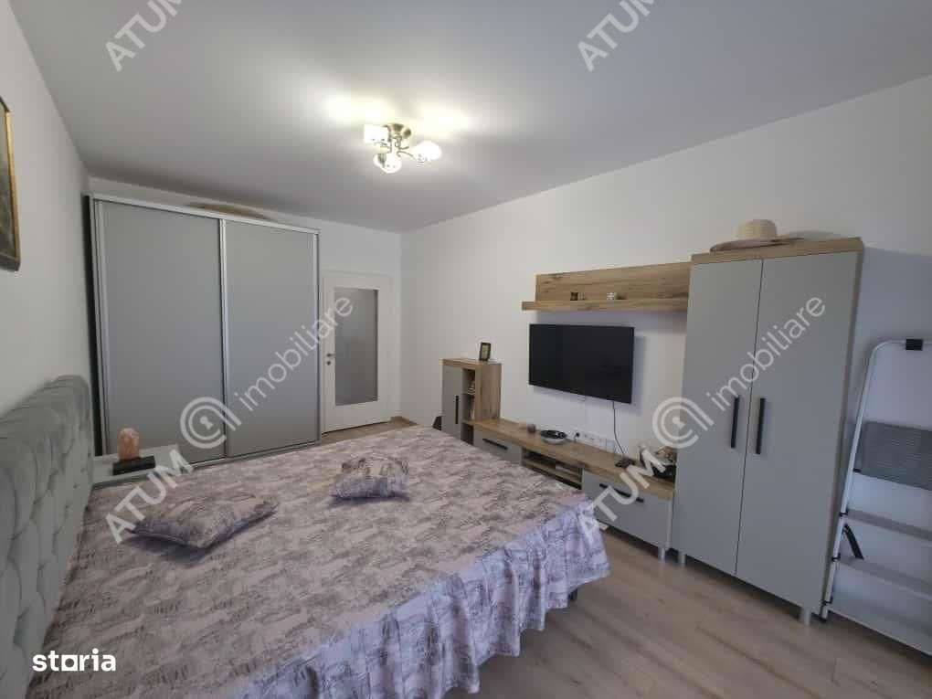 Garsoniera decomandata cu balcon si parcare in zona DaVinci din Sibiu-3