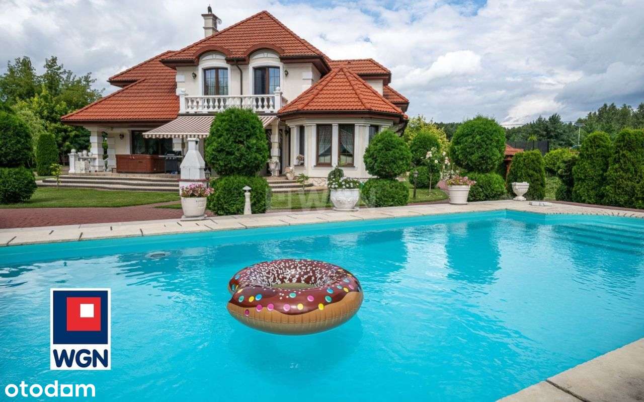 Luksus i funkcjonalność w otoczeniu natury – dom z basenem.-9