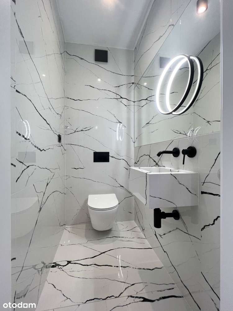 Elegancki dom parterowy z garażem w bryle budynku oraz dużą działką !-18