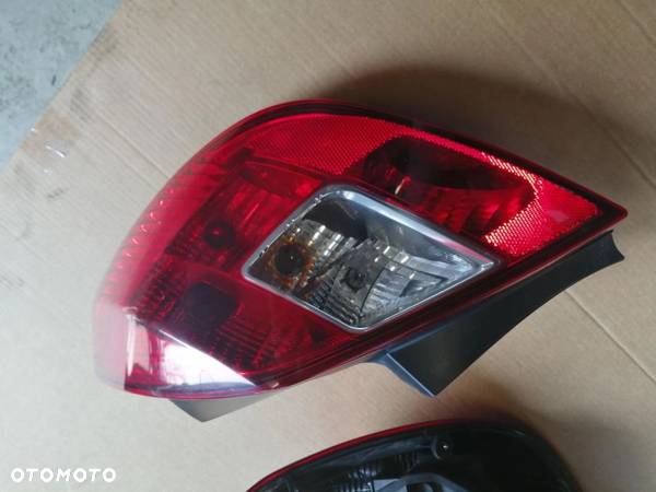 Opel Corsa D Lampa tył tylnie prawa lewa 5D - 2