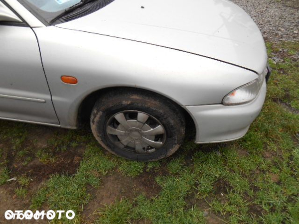 BłOTNIK PRAWY MITSUBISHI LANCER KPL 1994r - 3