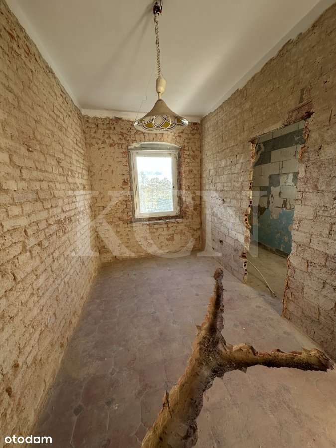 Połówka  domu a w nim 2 samodzielne mieszkania-15