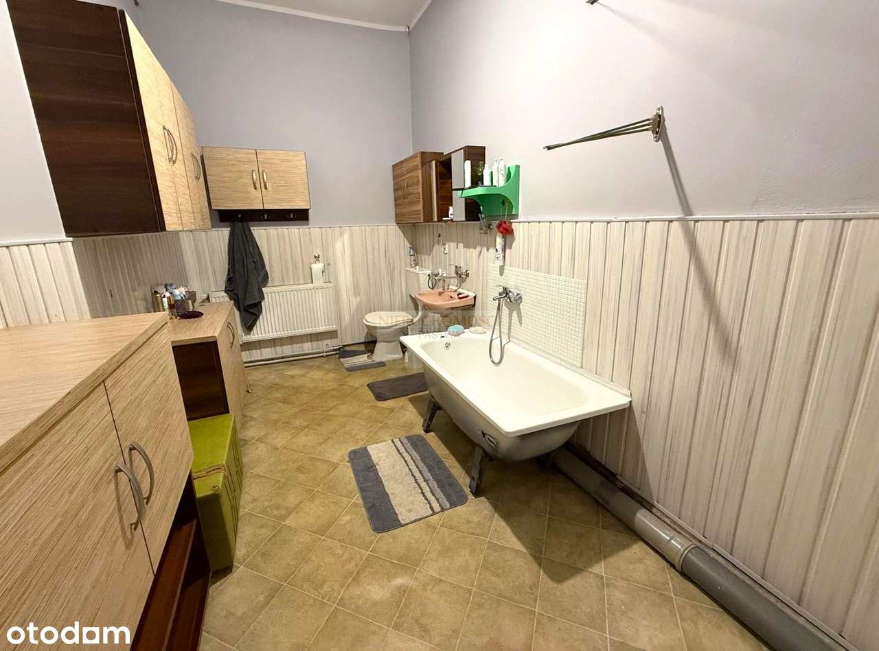Mieszkanie z potencjałem i dużą działką budowlaną!-9