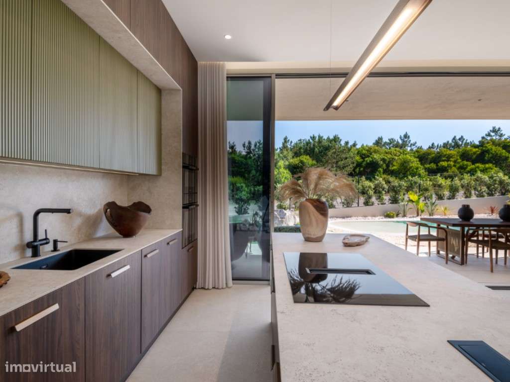 Moradia de extraordinária qualidade junto à lagoa, golfe e praia-7