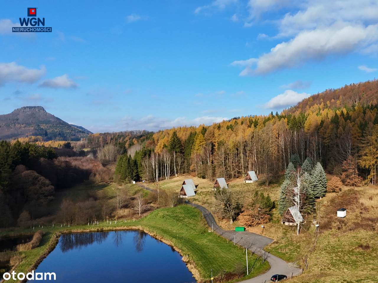 Grunt zabudowany 10-ma domkami nad jeziorem - na sprzedaż.-7