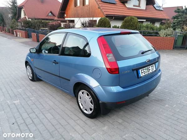 Ford Fiesta 1.4 Ghia - 4