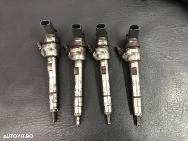 Injector BMW Seria E87 120d Manual 2011 - 1