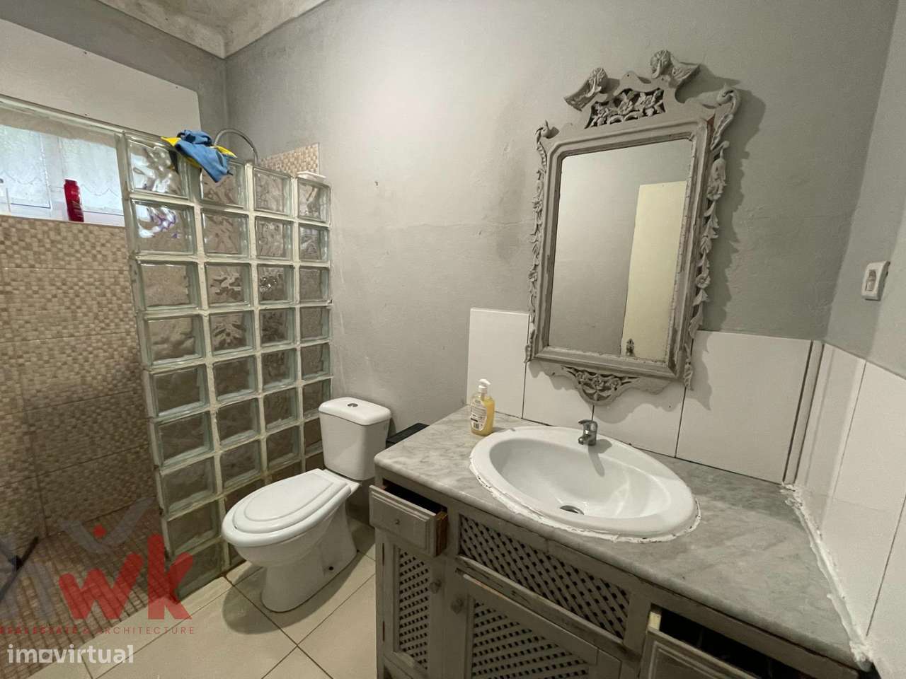 Casa dividida em 3 apartamentos com garagem-10