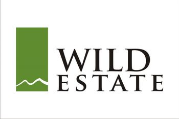 Nieruchomości Wild Estate Logo