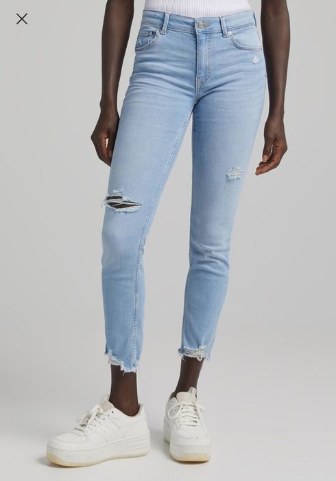 Spodnie jeansowe Bershka przecierane z dziurami r. 38