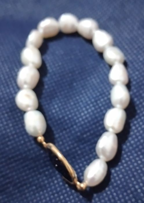 Pulseira de pérolas com prata