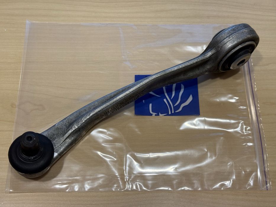 Рячаг на макан macan - верхний правый - восстановленный 8K0407509P TRW