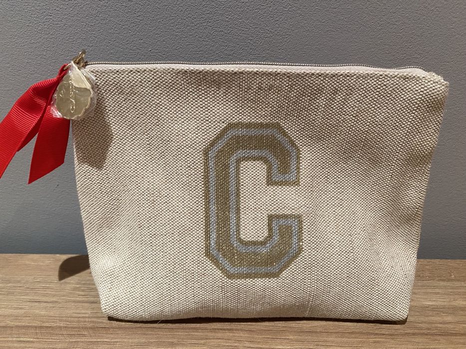 Bolsa de maquilhagem Clarins