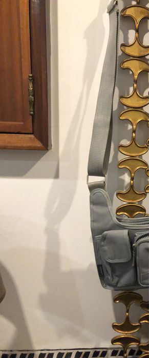 Mala de tiracolo LACOSTE com varios bolsos