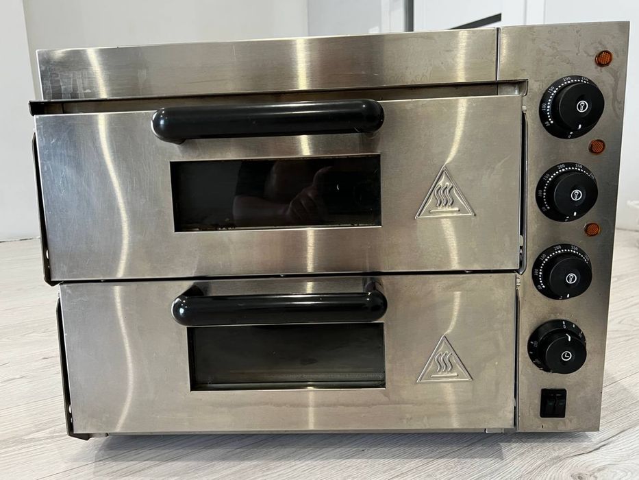 Продаж пічки для випікання піци