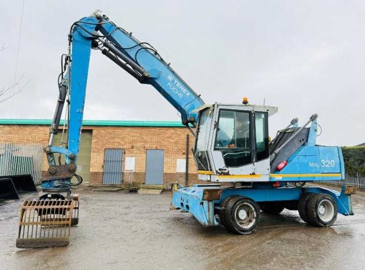 Екскаватор для перевалки лісу , металолома FUCHS MHL 320