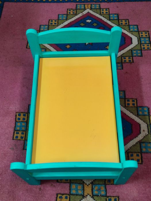Cama para bonecas