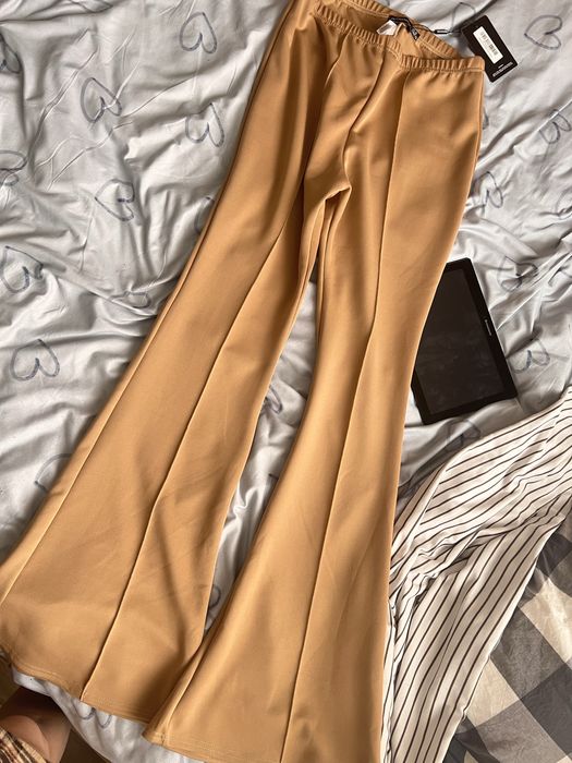 Штани лосини кльош