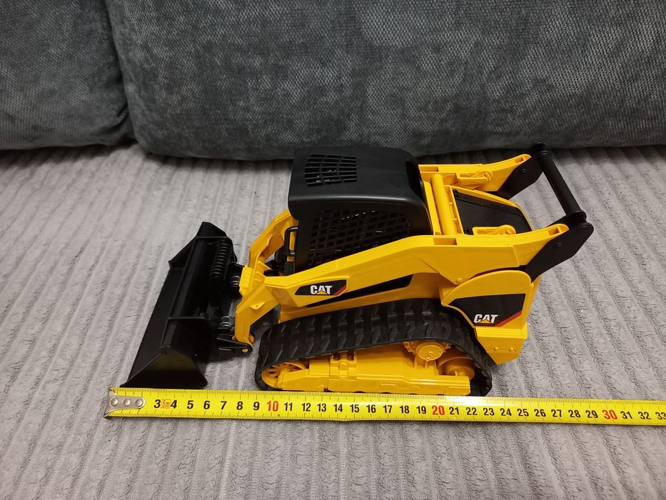 Гусеничний міні-навантажувач CAT від Bruder